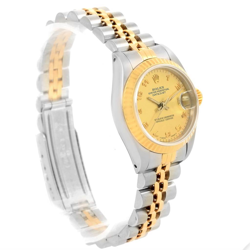 The Rolex Datejust 69173 Women's Stainless Steel Champagne Dial 69173 Women's Stainless Steel Champagne Dial watch is shown at an angle highlighting the face, bezel, and part of the two-tone bracelet.