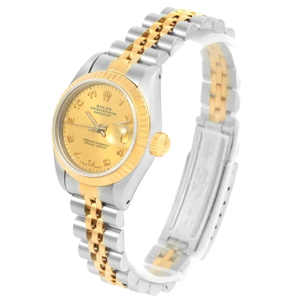 The Rolex Datejust 69173 Women's Stainless Steel Champagne Dial 69173 Women's Stainless Steel Champagne Dial watch is shown at a slight side angle, highlighting its bezel, dial, and two-tone bracelet.
