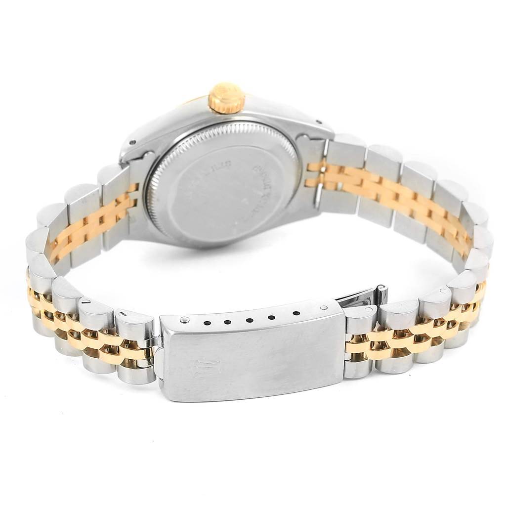 This image shows the back of a Rolex Datejust 69173 Women's Stainless Steel Champagne Dial 69173 Women's Stainless Steel Champagne Dial watch with a two-tone bracelet and clasp.
