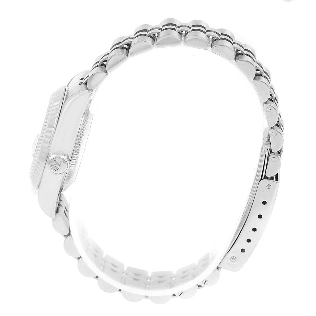 This image shows a side view of the Rolex Datejust 69174 Women's Stainless Steel Blue Dial 69174 Women's Stainless Steel Blue Dial watch focusing on the crown and bracelet.