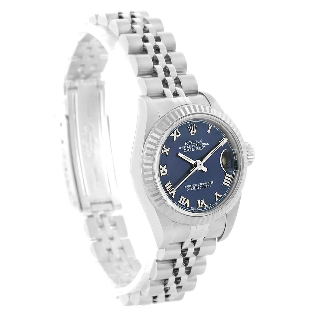 The image shows a Rolex Datejust 69174 Women's Stainless Steel Blue Dial 69174 Women's Stainless Steel Blue Dial watch at a three-quarter angle, highlighting its face, bezel, and Jubilee bracelet.