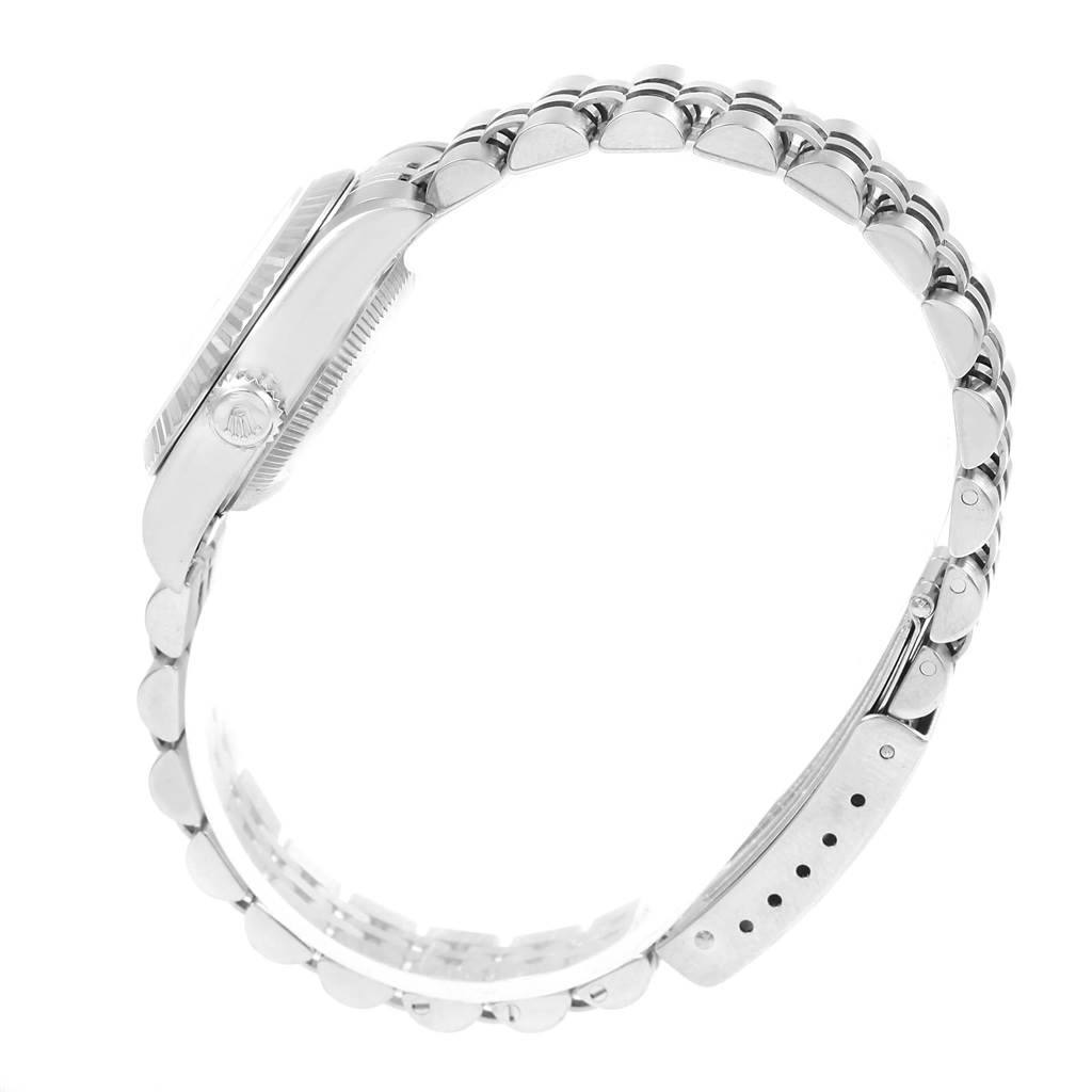 The image shows a side view of a Rolex Datejust 79174 Women
s Stainless Steel Silver Dial 79174 Women
s Stainless Steel Silver Dial watch, focusing on the case and bracelet.