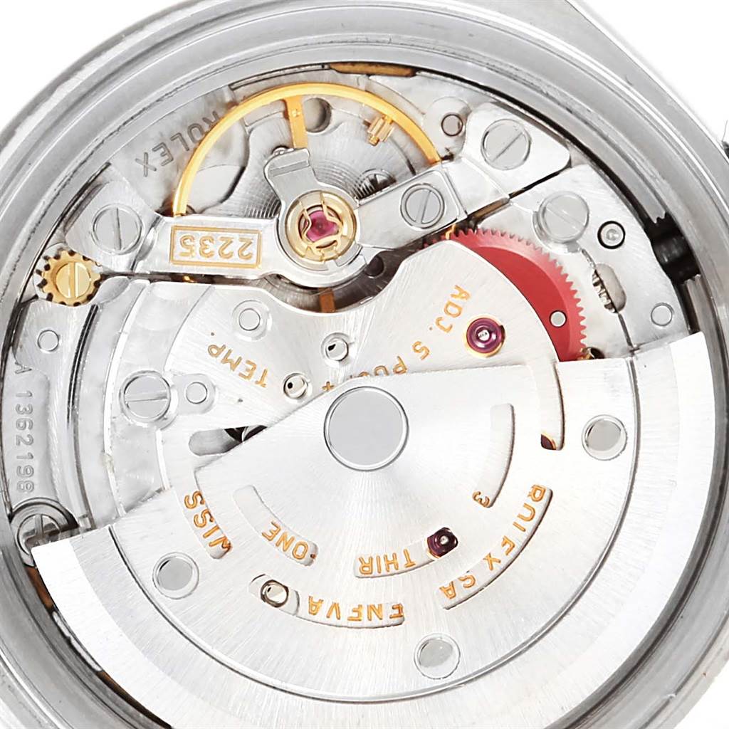 This image shows a close-up of the movement mechanism of a Rolex Datejust 79174 Women's Stainless Steel Mother of Pearl Dial 79174 Women's Stainless Steel Mother of Pearl Dial watch, highlighting intricate components.