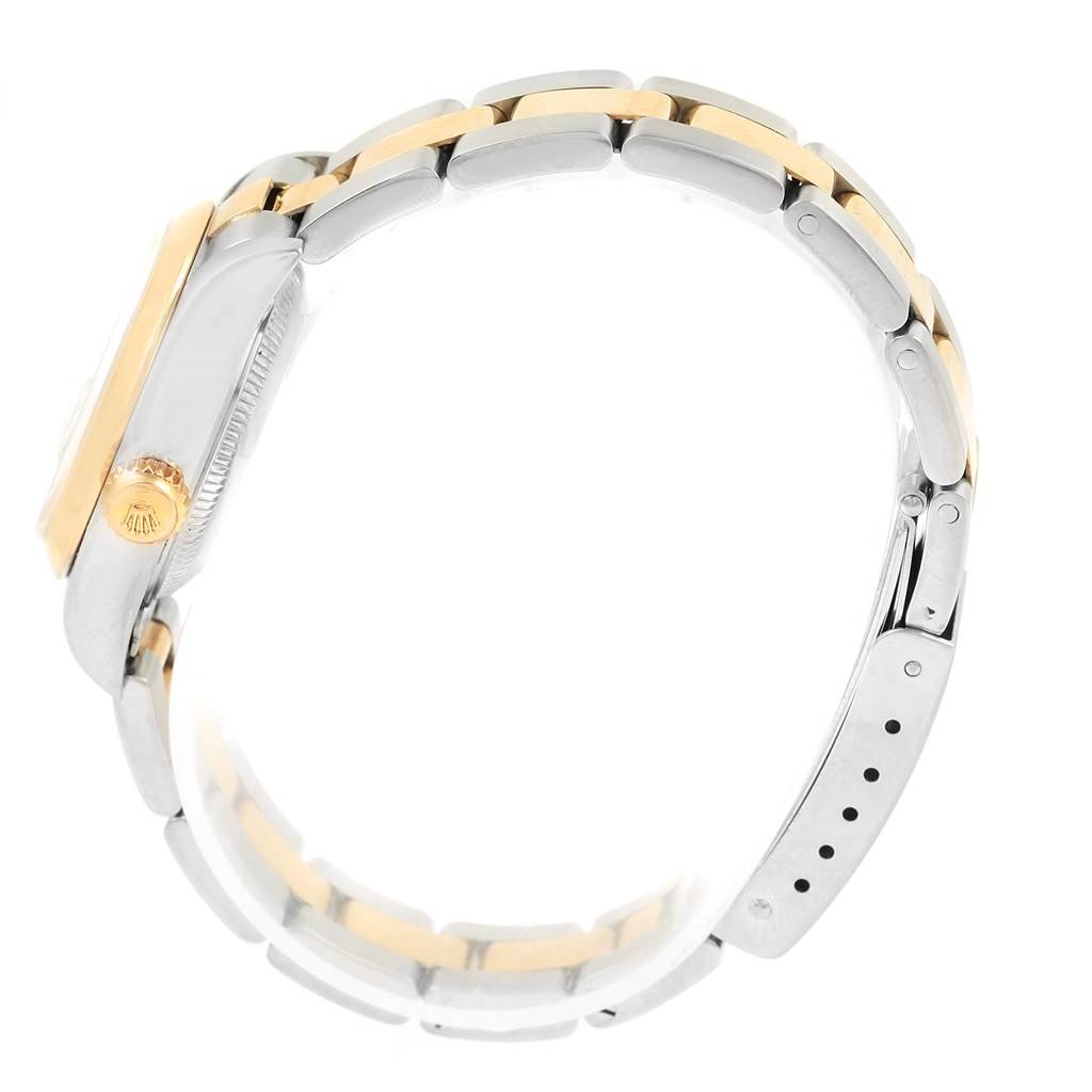 The image shows a side view of a Rolex Datejust 79163 Women's Steel and Gold (two tone) White Dial 79163 Women's Steel and Gold (two tone) White Dial watch, focusing on the bracelet, crown, and part of the case.