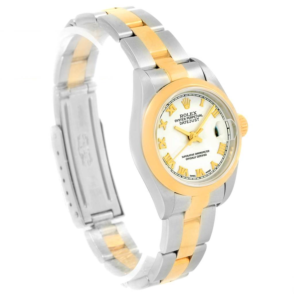 This image shows a side angle of a Rolex Datejust 79163 Women's Steel and Gold (two tone) White Dial 79163 Women's Steel and Gold (two tone) White Dial watch, featuring its two-tone metal bracelet and watch face.