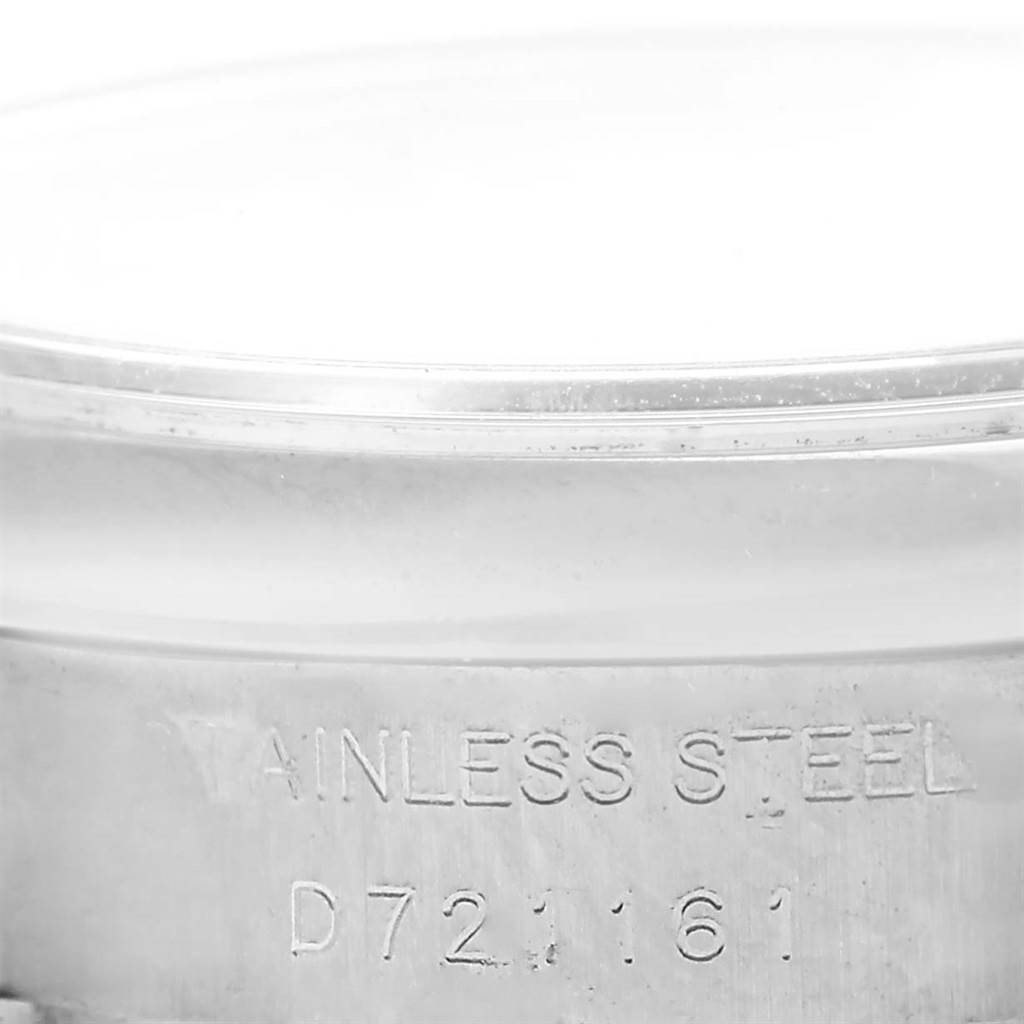 The image shows a close-up of the stainless steel case back and serial number of a Rolex Datejust 179160 Women's Stainless Steel Silver Dial 179160 Women's Stainless Steel Silver Dial watch.