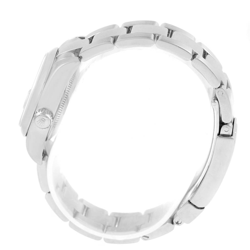 This side view of the Rolex Datejust 179160 Women's Stainless Steel Silver Dial 179160 Women's Stainless Steel Silver Dial watch showcases the case, bracelet, and crown.