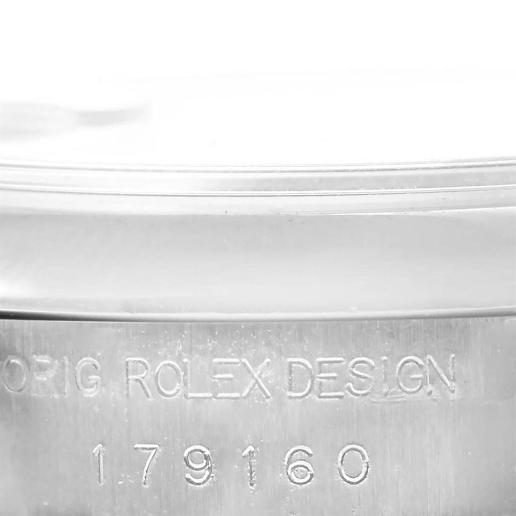 This image shows a close-up of the side of a Rolex Datejust 179160 Women's Stainless Steel Silver Dial 179160 Women's Stainless Steel Silver Dial watch case, highlighting the model number and "Orig Rolex Design" engraving.