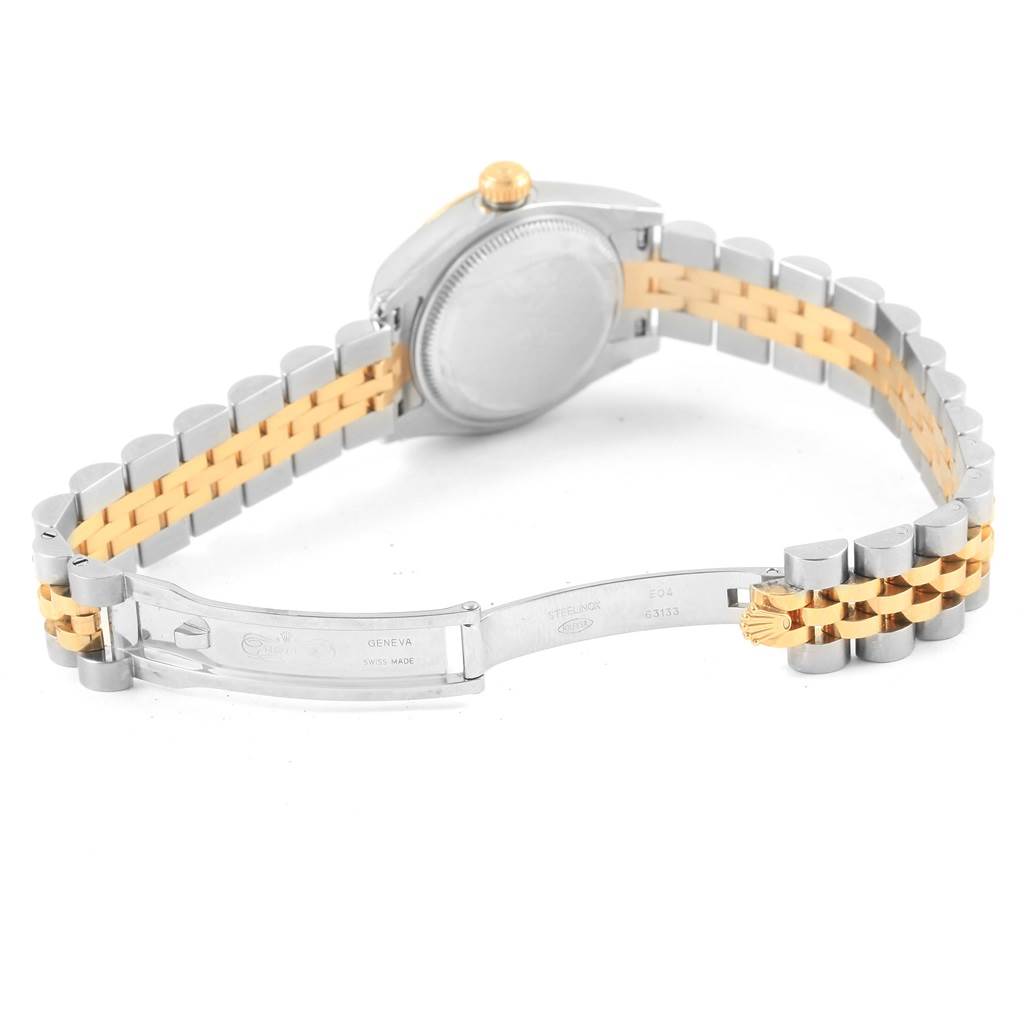 The image shows the back of a Rolex Datejust 179173 Women's Steel and Gold (two tone) White Dial 179173 Women's Steel and Gold (two tone) White Dial watch, highlighting the case back, bracelet, and clasp.