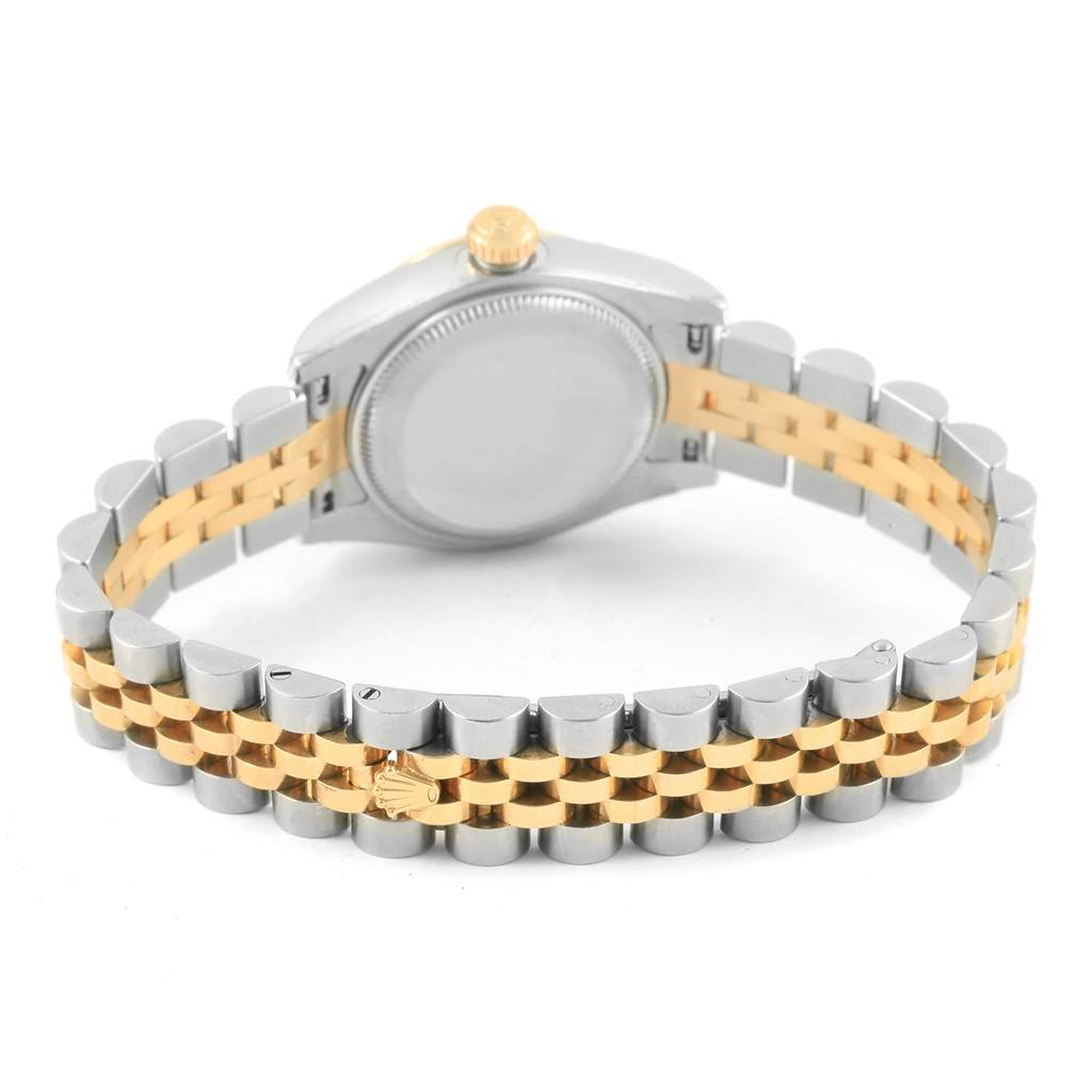 This image shows the back and bracelet of a Rolex Datejust 179173 Women's Steel and Gold (two tone) White Dial 179173 Women's Steel and Gold (two tone) White Dial watch in a two-tone design.