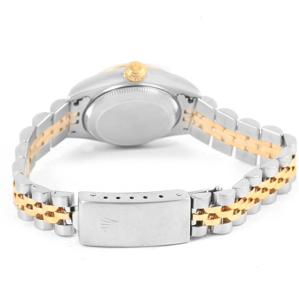 This image shows the back view of a Rolex Datejust 79173 Women's Stainless Steel Silver Dial 79173 Women's Stainless Steel Silver Dial watch, featuring its case back and two-tone bracelet clasp.