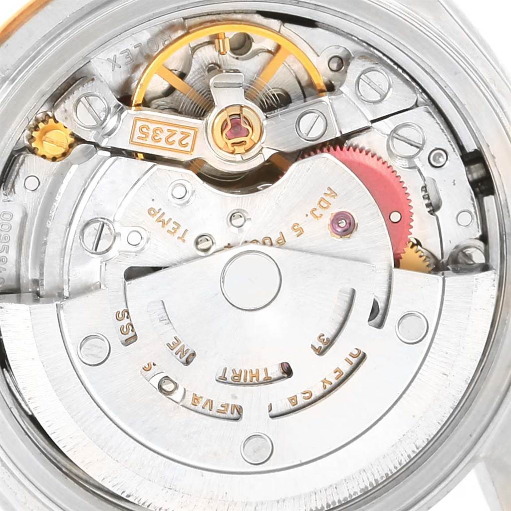 This image shows a close-up of the mechanical movement of the Rolex Datejust 79173 Women's Steel and Gold (two tone) Black Dial 79173 Women's Steel and Gold (two tone) Black Dial watch.