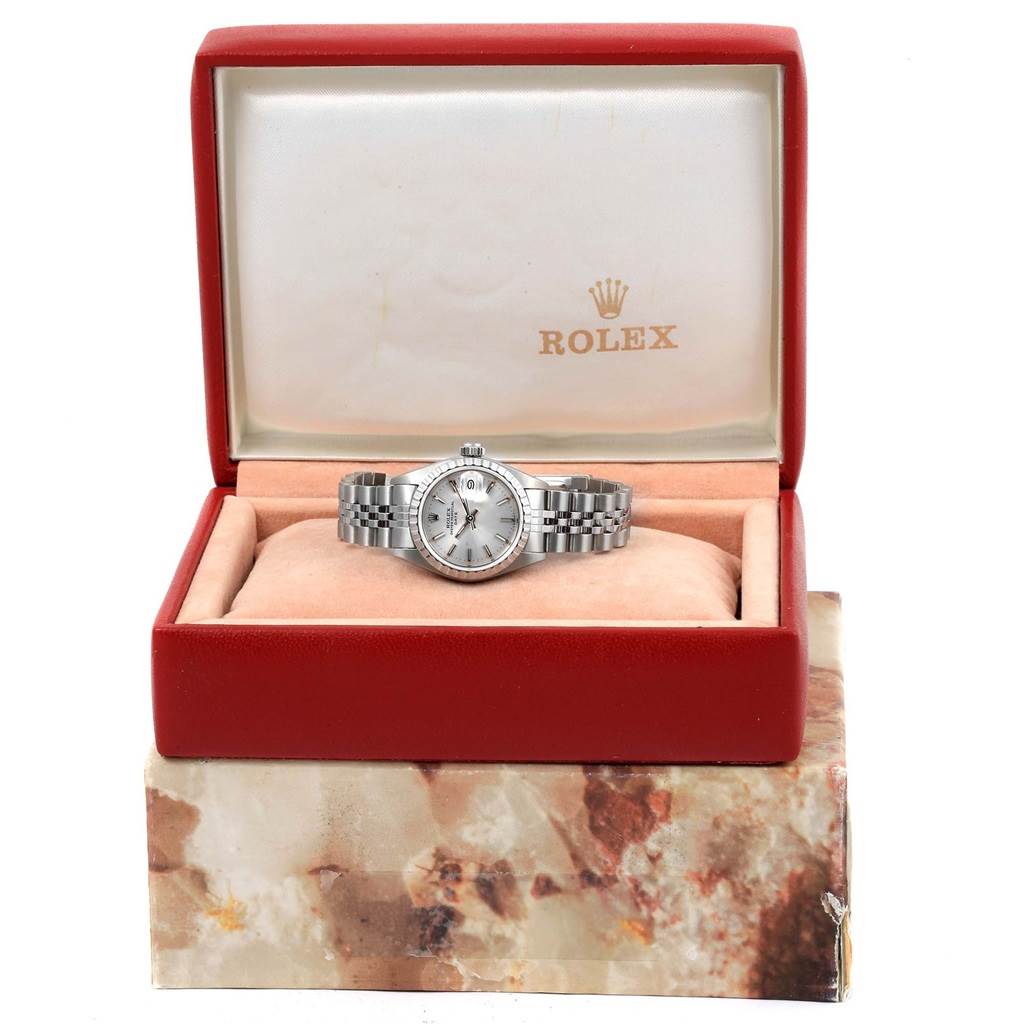 The Rolex Datejust 69240 Women's Stainless Steel Silver Dial 69240 Women's Stainless Steel Silver Dial watch is shown from the front, housed in its original red box with the brand logo visible on the interior lid.