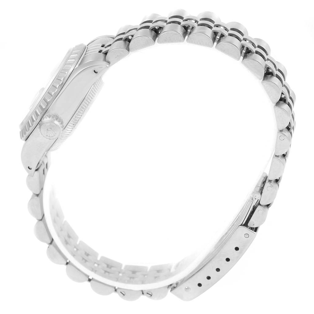 The image displays a side profile of a Rolex Datejust 69240 Women's Stainless Steel Silver Dial 69240 Women's Stainless Steel Silver Dial watch, showcasing the case, bezel, crown, and bracelet.