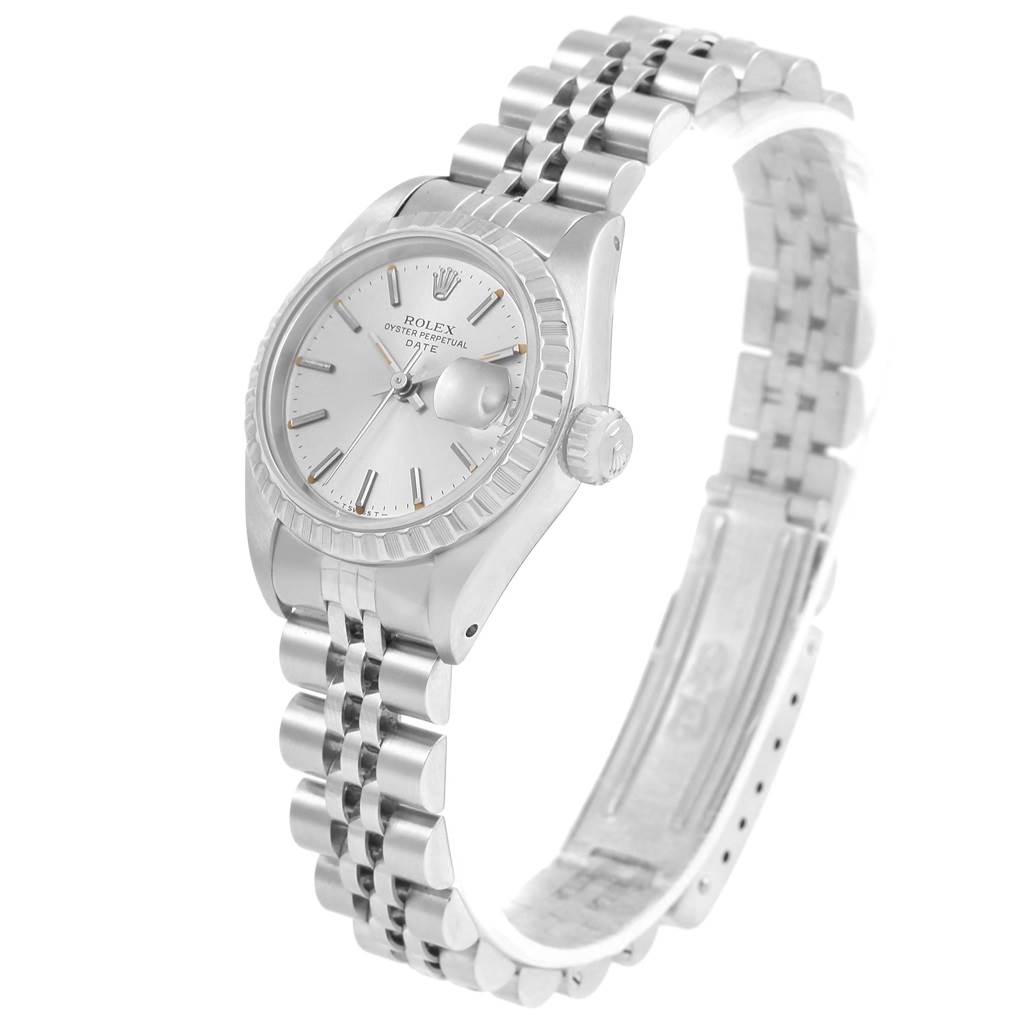This image showcases a Rolex Datejust 69240 Women's Stainless Steel Silver Dial 69240 Women's Stainless Steel Silver Dial watch from a slight side angle, highlighting the watch face, bezel, crown, and bracelet.