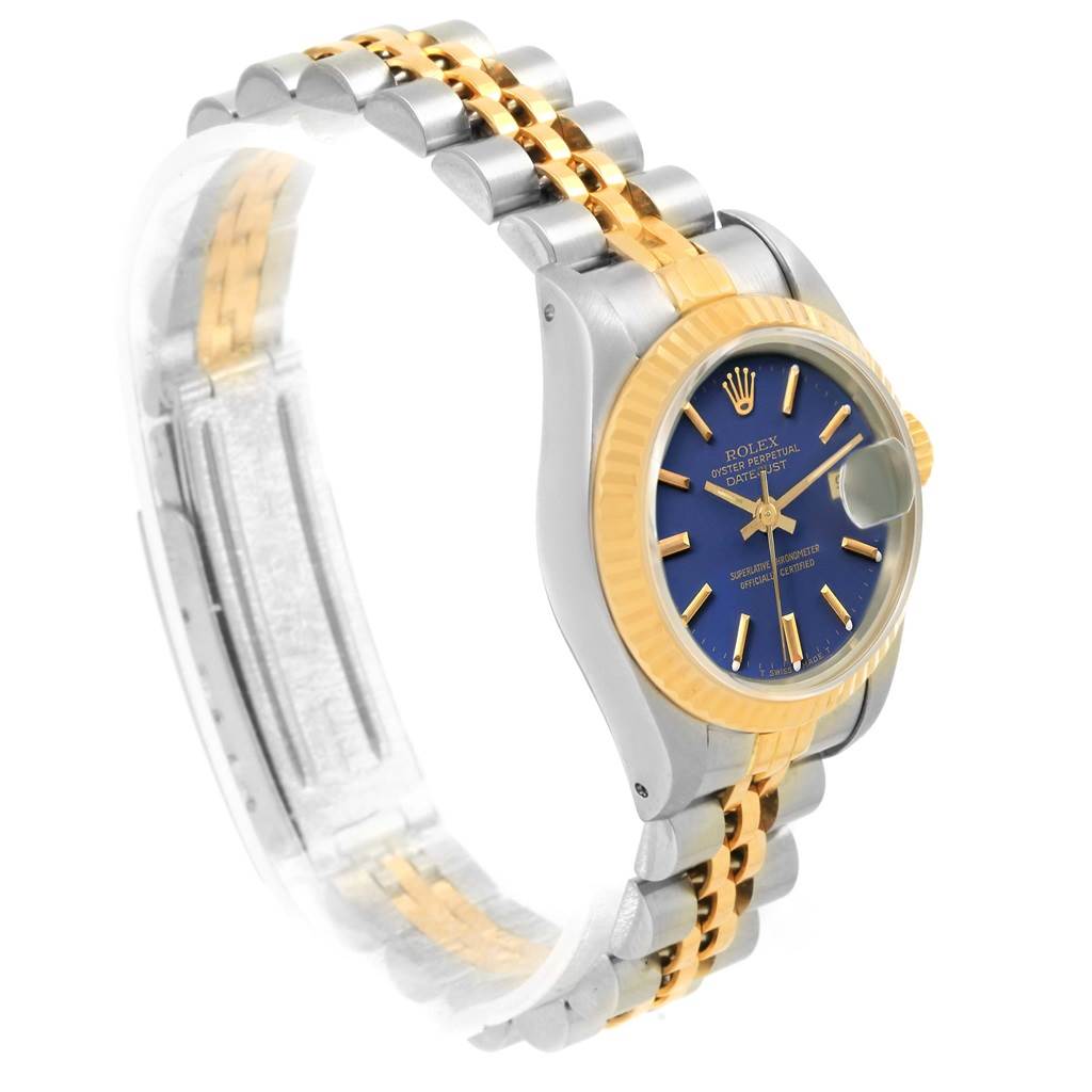 The image shows a Rolex Datejust 69173 Women's Stainless Steel Blue Dial 69173 Women's Stainless Steel Blue Dial watch at a slight angle, highlighting the two-tone bracelet, blue dial, and fluted bezel.