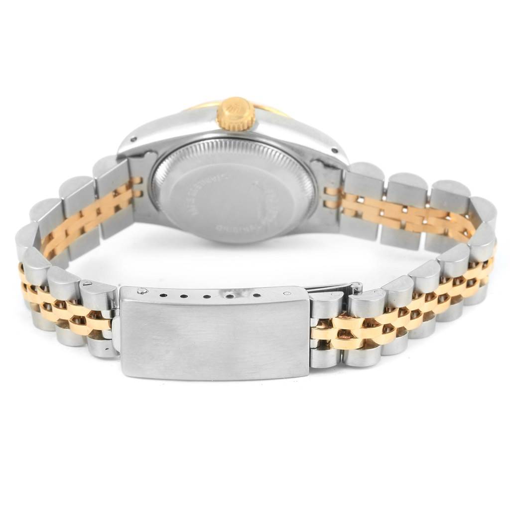 The image shows the back view of a Rolex Datejust 69173 Women's Stainless Steel Blue Dial 69173 Women's Stainless Steel Blue Dial watch, highlighting its case, crown, and two-tone metal bracelet with a clasp.