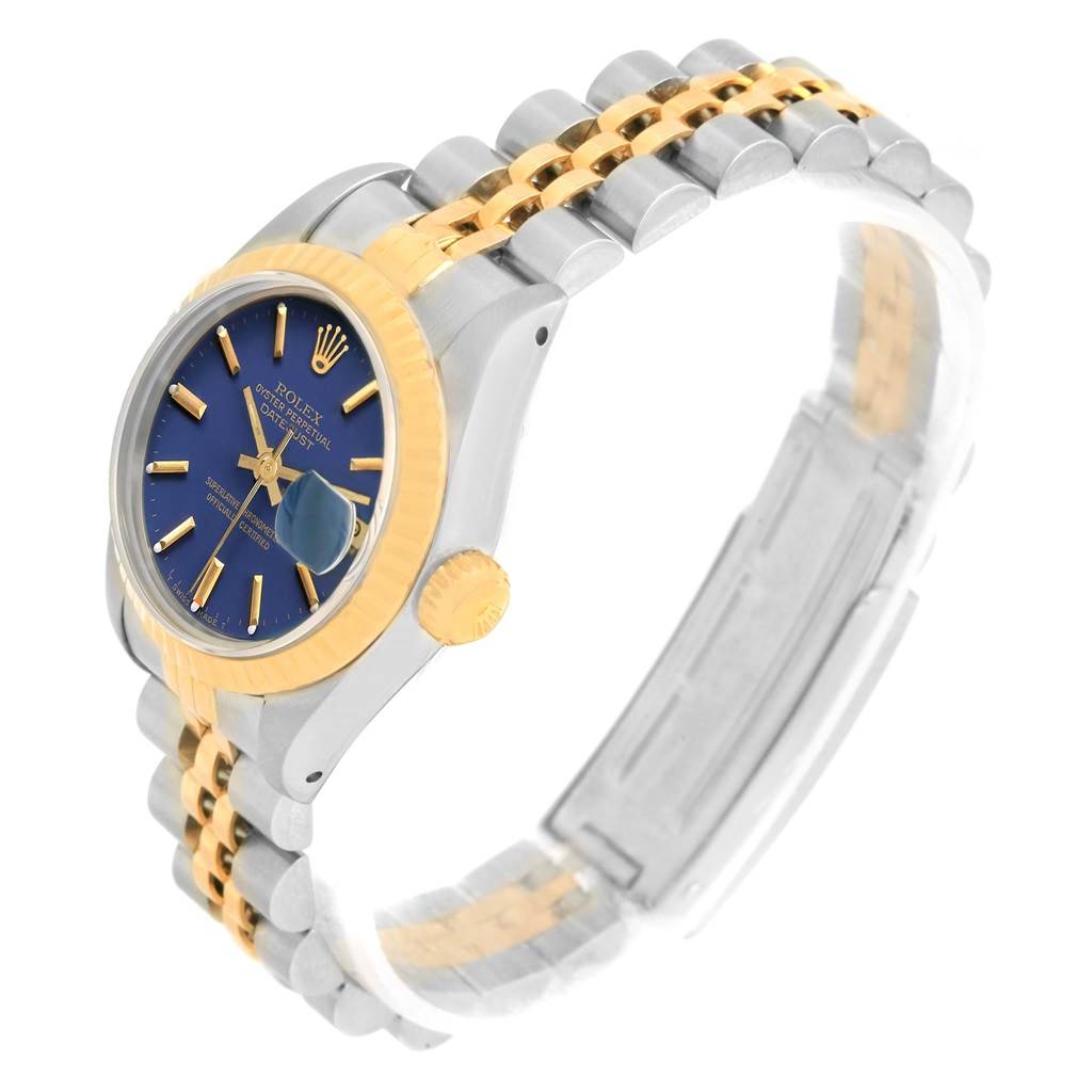 The Rolex Datejust 69173 Women's Stainless Steel Blue Dial 69173 Women's Stainless Steel Blue Dial watch is shown at an angle displaying the bezel, crown, dial, and part of the bracelet.