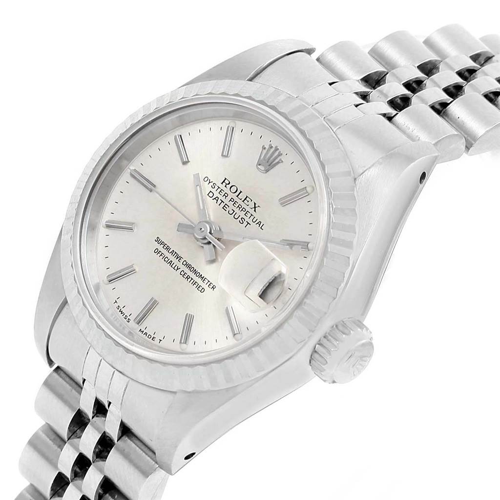 This image shows a Rolex Datejust 69174 Women's Stainless Steel Silver Dial 69174 Women's Stainless Steel Silver Dial watch at an angle emphasizing the dial, bezel, crown, and part of the bracelet.