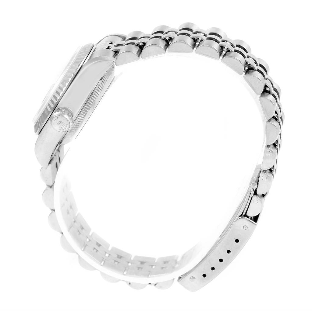 The image shows a side view of the Rolex Datejust 69174 Women's Stainless Steel Silver Dial 69174 Women's Stainless Steel Silver Dial watch, highlighting its case, crown, and bracelet.