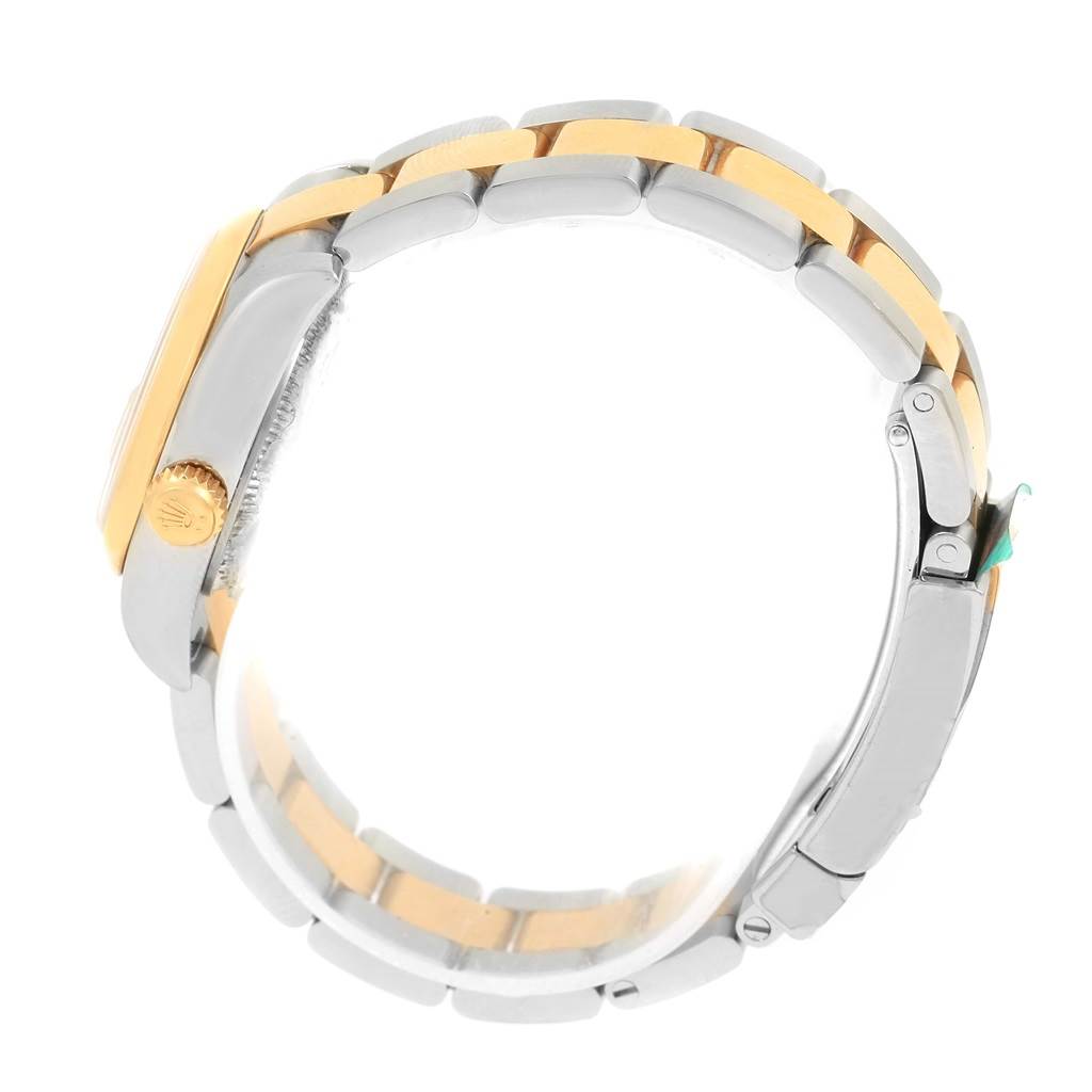 The image shows a side view of the Rolex Datejust 179163 Women's Stainless Steel Mother of Pearl Dial 179163 Women's Stainless Steel Mother of Pearl Dial watch, focusing on its two-tone bracelet and crown.