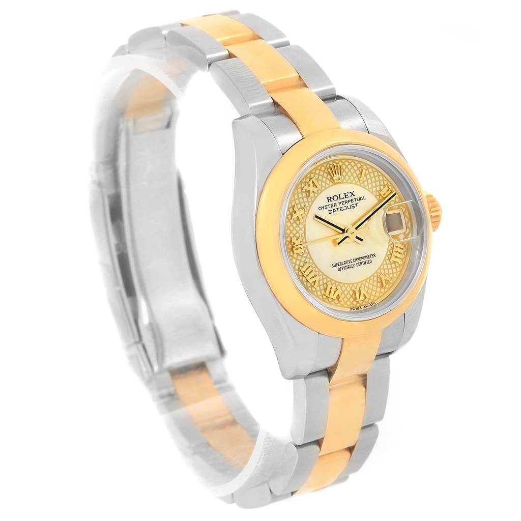 This Rolex Datejust 179163 Women's Stainless Steel Mother of Pearl Dial 179163 Women's Stainless Steel Mother of Pearl Dial watch is shown at an angled side view, featuring a two-tone gold and silver bracelet and a gold patterned dial.
