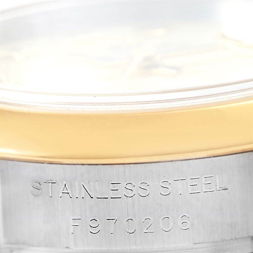 The image focuses on the side view of the Rolex Datejust 179163 Women's Stainless Steel Mother of Pearl Dial 179163 Women's Stainless Steel Mother of Pearl Dial watch, showing the stainless steel case and part of the bezel.