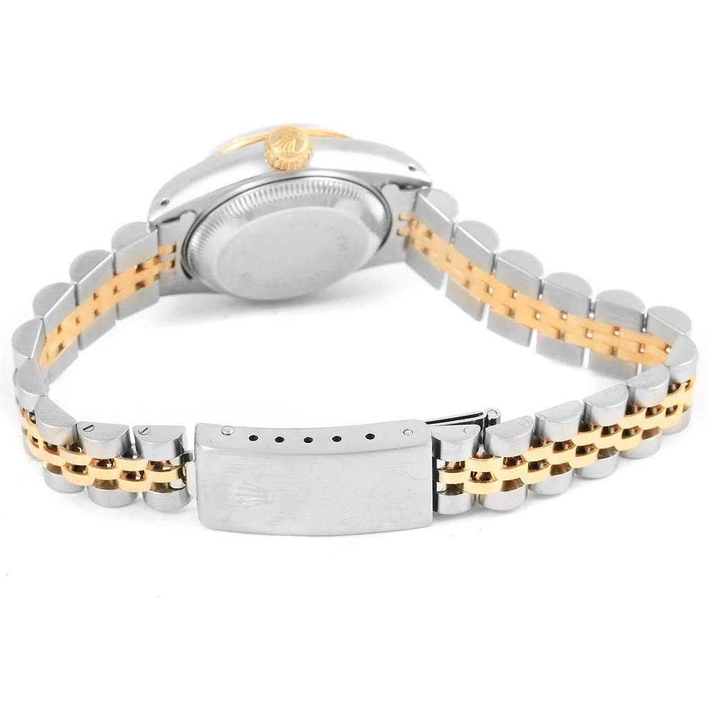 The image shows the back case, crown, and band clasp of a Rolex Datejust 69173 Women's Stainless Steel Champagne Dial 69173 Women's Stainless Steel Champagne Dial watch, emphasizing the two-tone bracelet.