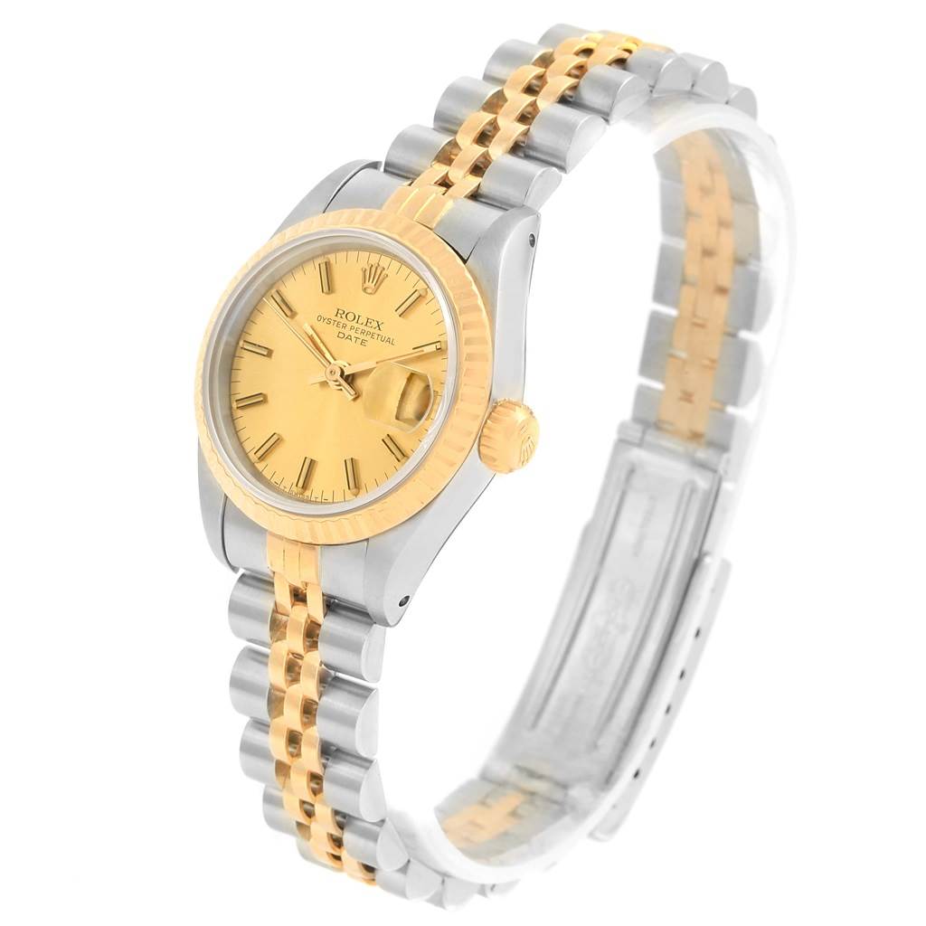 The image shows a side profile of a Rolex Datejust 69173 Women's Stainless Steel Champagne Dial 69173 Women's Stainless Steel Champagne Dial watch, highlighting its two-tone bracelet and gold dial.