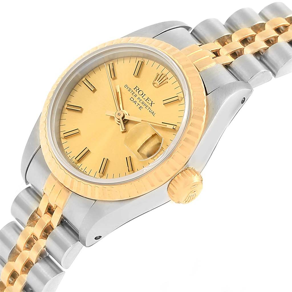 The image shows a Rolex Datejust 69173 Women's Stainless Steel Champagne Dial 69173 Women's Stainless Steel Champagne Dial watch at an angle highlighting the dial, crown, and part of the Jubilee bracelet.