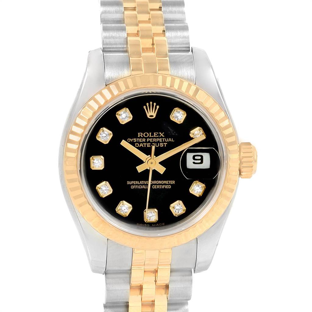 This image shows a front view of a Rolex Datejust 179173 Women
s Steel and Gold (two tone) Black Dial 179173 Women
s Steel and Gold (two tone) Black Dial watch, highlighting its bezel, dial, hands, and crown.