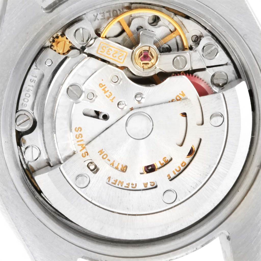 The image shows the movement and inner mechanism of a Rolex Datejust 179173 Women's Steel and Gold (two tone) White Dial 179173 Women's Steel and Gold (two tone) White Dial watch from a close-up angle.