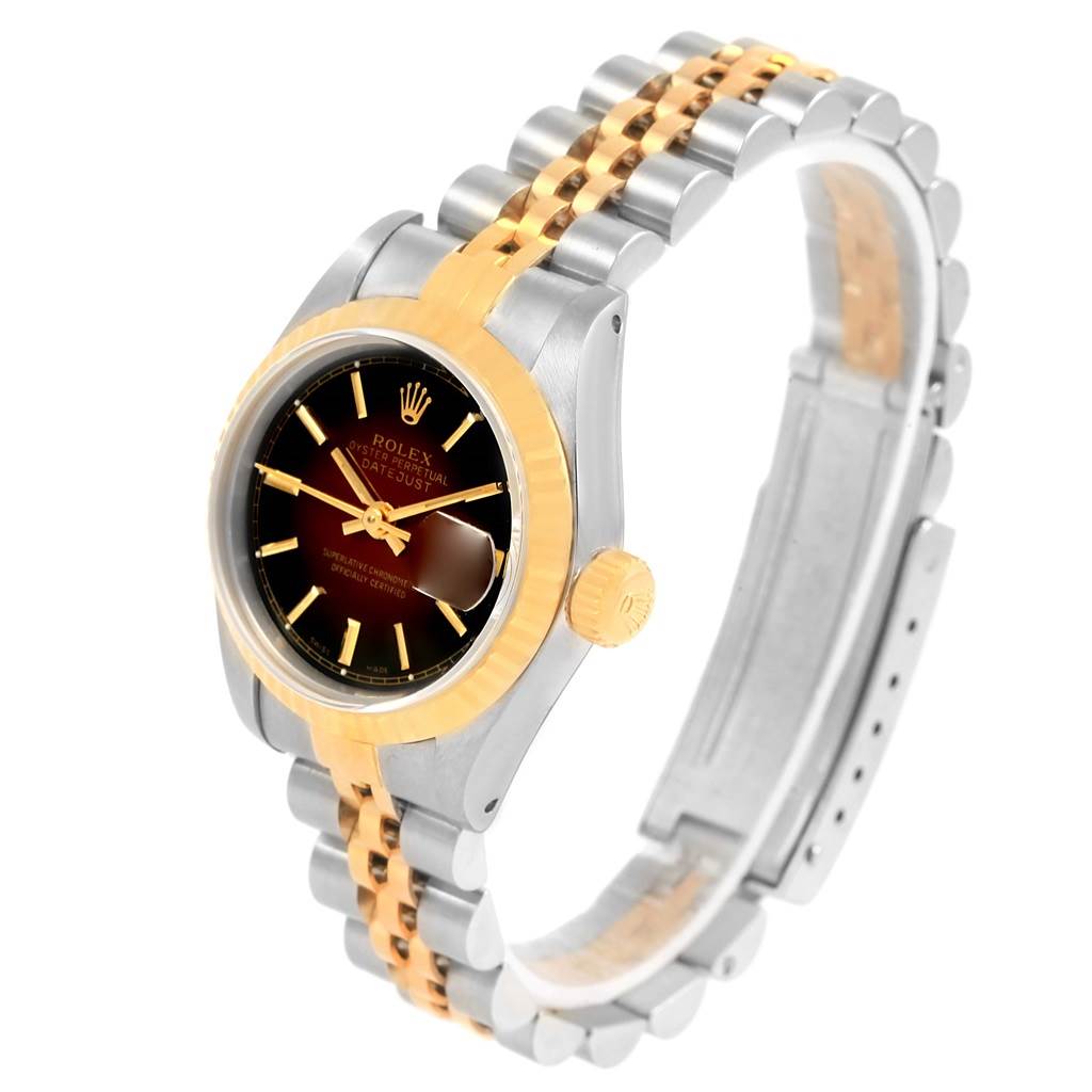 The Rolex Datejust 69173 Women's Stainless Steel Brown Dial 69173 Women's Stainless Steel Brown Dial watch is displayed at a slight angle, showing the bezel, dial, crown, and two-tone bracelet.