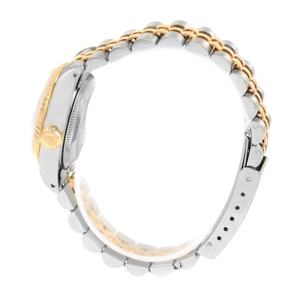 This image shows a side view of the Rolex Datejust 69173 Women's Stainless Steel Brown Dial 69173 Women's Stainless Steel Brown Dial watch, highlighting the bezel, crown, and bracelet.