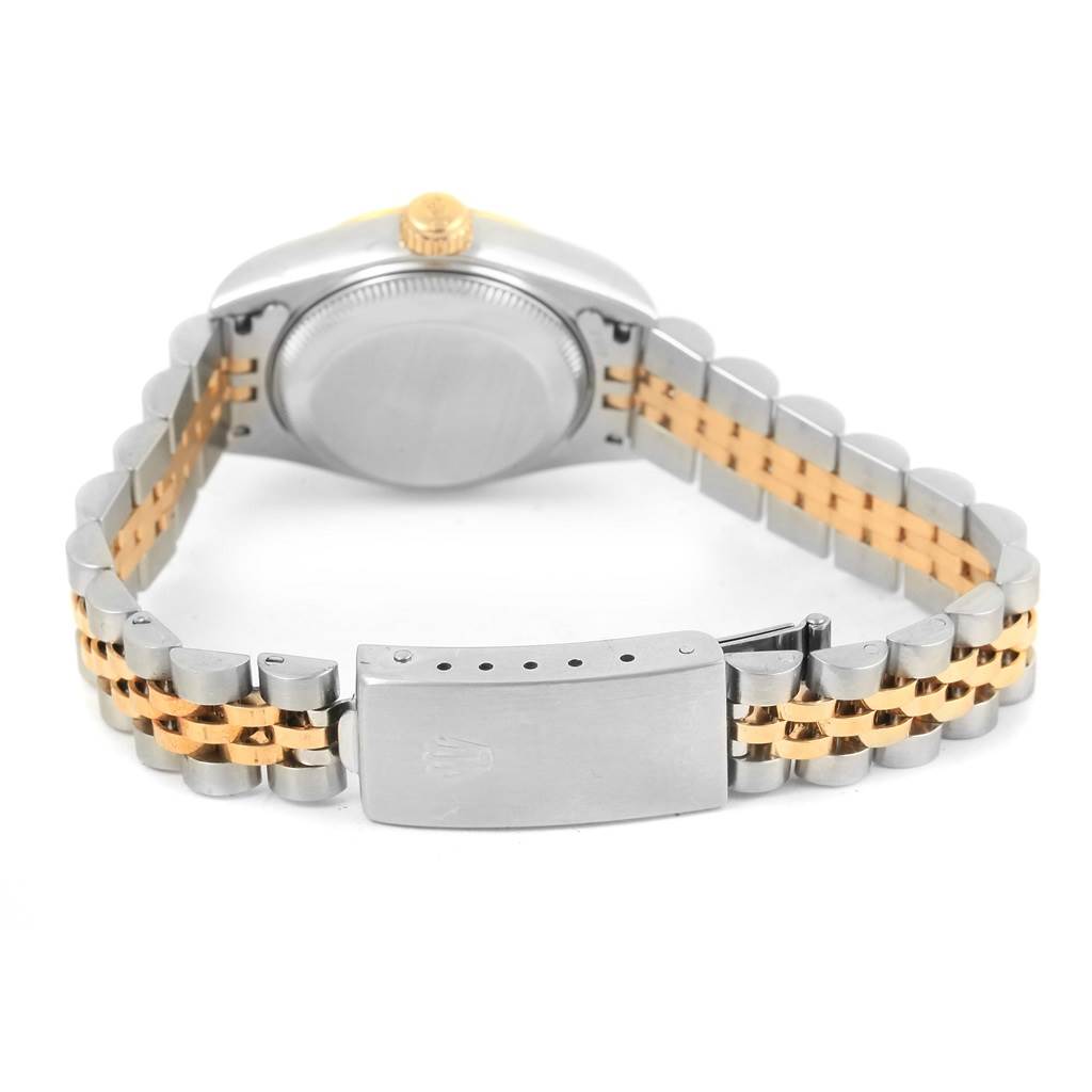 This is a rear view of a Rolex Datejust 79173 Women's Steel and Gold (two tone) Black Dial 79173 Women's Steel and Gold (two tone) Black Dial watch, highlighting its case back, crown, and Jubilee bracelet with a two-tone design.