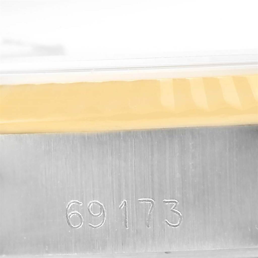 This image shows a close-up of the model number "69173" engraved on the casing of a Rolex Datejust 69173 Women's Stainless Steel Champagne Dial 69173 Women's Stainless Steel Champagne Dial watch.