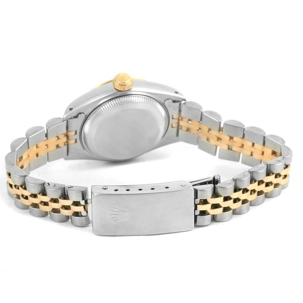 The image shows the back view of a Rolex Datejust 69173 Women's Stainless Steel Champagne Dial 69173 Women's Stainless Steel Champagne Dial watch, highlighting the stainless steel and gold jubilee bracelet and the clasp.