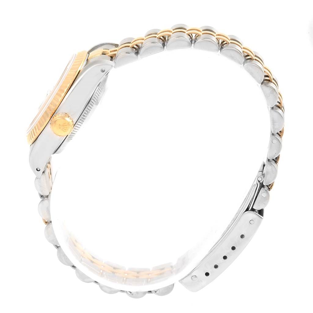 The image shows a side view of the Rolex Datejust 69173 Women's Stainless Steel Champagne Dial 69173 Women's Stainless Steel Champagne Dial watch, highlighting its case, crown, bezel, and bracelet.