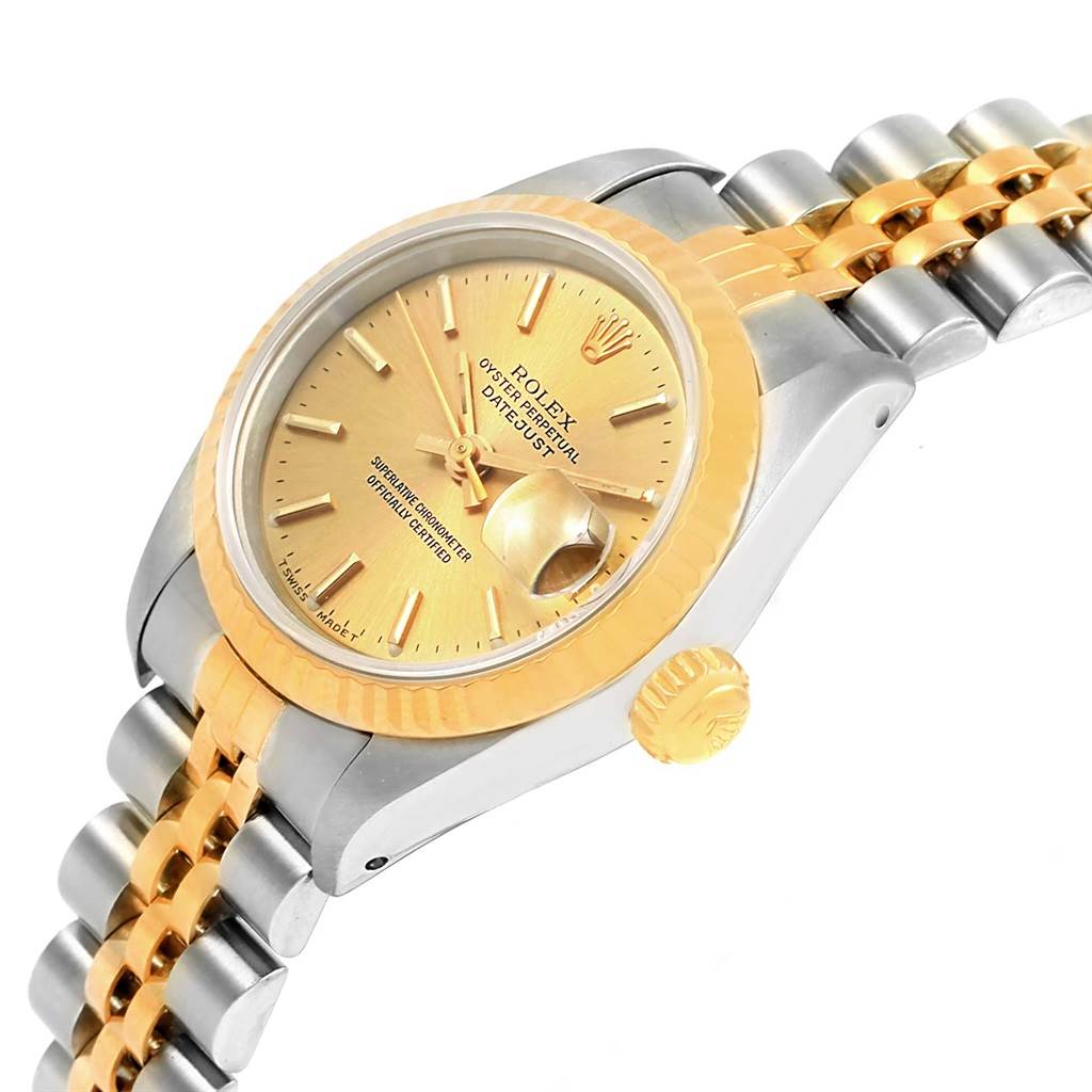 The image shows a side angle of the Rolex Datejust 69173 Women's Stainless Steel Champagne Dial 69173 Women's Stainless Steel Champagne Dial watch, highlighting the crown, bezel, dial, and part of the bracelet.