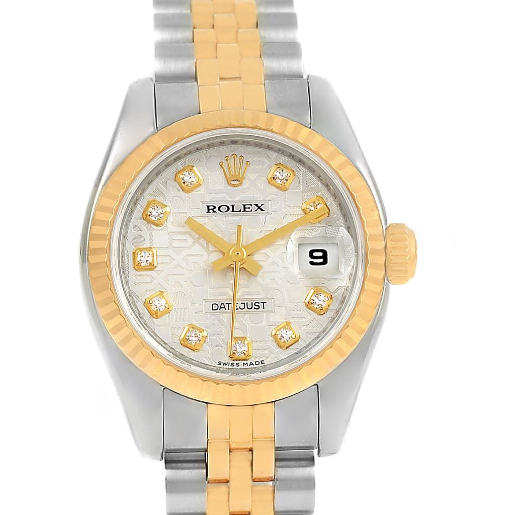 This image shows a frontal view of a Rolex Datejust 179173 Women's Steel and Gold (two tone) Silver Dial 179173 Women's Steel and Gold (two tone) Silver Dial watch, highlighting its dial, bezel, and part of its bracelet.