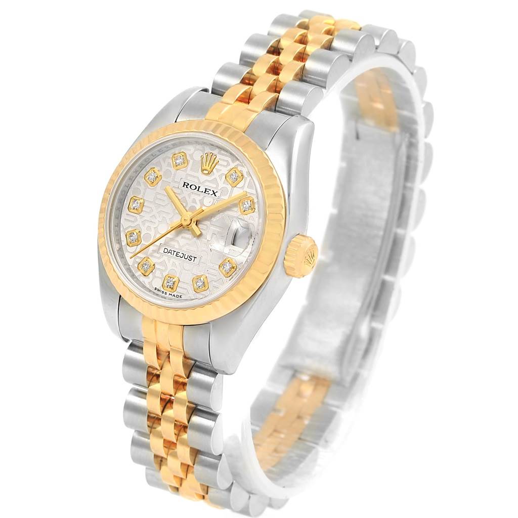 This image shows a Rolex Datejust 179173 Women's Steel and Gold (two tone) Silver Dial 179173 Women's Steel and Gold (two tone) Silver Dial watch angled to display its face, two-tone bracelet, and crown.