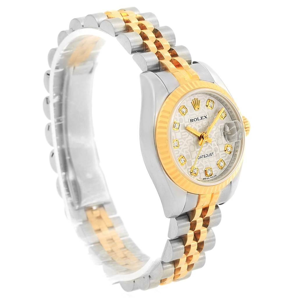 This Rolex Datejust 179173 Women's Steel and Gold (two tone) Silver Dial 179173 Women's Steel and Gold (two tone) Silver Dial watch is shown at a three-quarter angle, featuring the face, dial, bezel, crown, and two-tone bracelet.