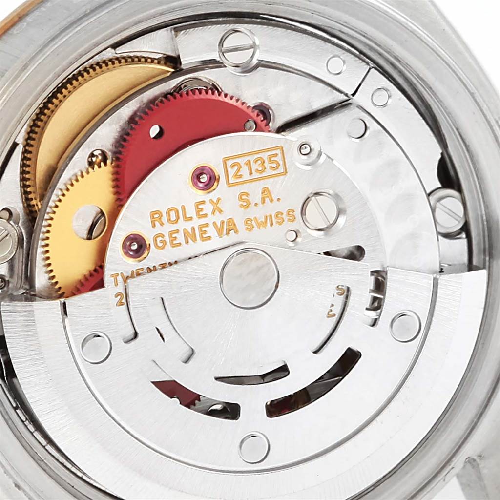 The image shows a close-up of the movement mechanism of a Rolex Datejust 69173 Women's Stainless Steel Beige Dial 69173 Women's Stainless Steel Beige Dial watch.