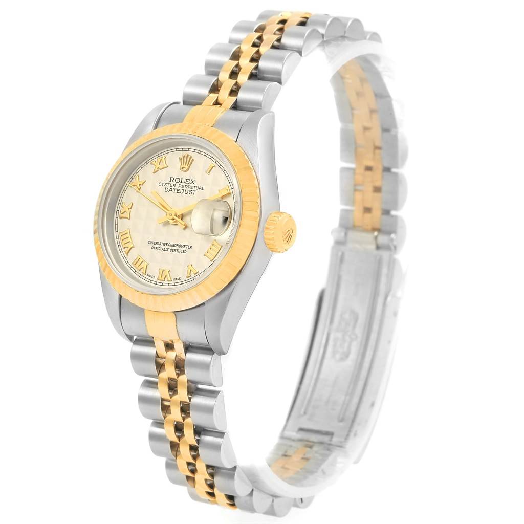 This Rolex Datejust 69173 Women's Stainless Steel Beige Dial 69173 Women's Stainless Steel Beige Dial is shown from a front-side angle, displaying its two-tone bracelet, fluted bezel, and champagne dial.