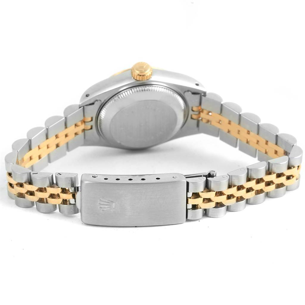 The image shows the back and clasp of a Rolex Datejust 69173 Women's Stainless Steel Black Dial 69173 Women's Stainless Steel Black Dial, highlighting its two-tone bracelet and the watch case back.