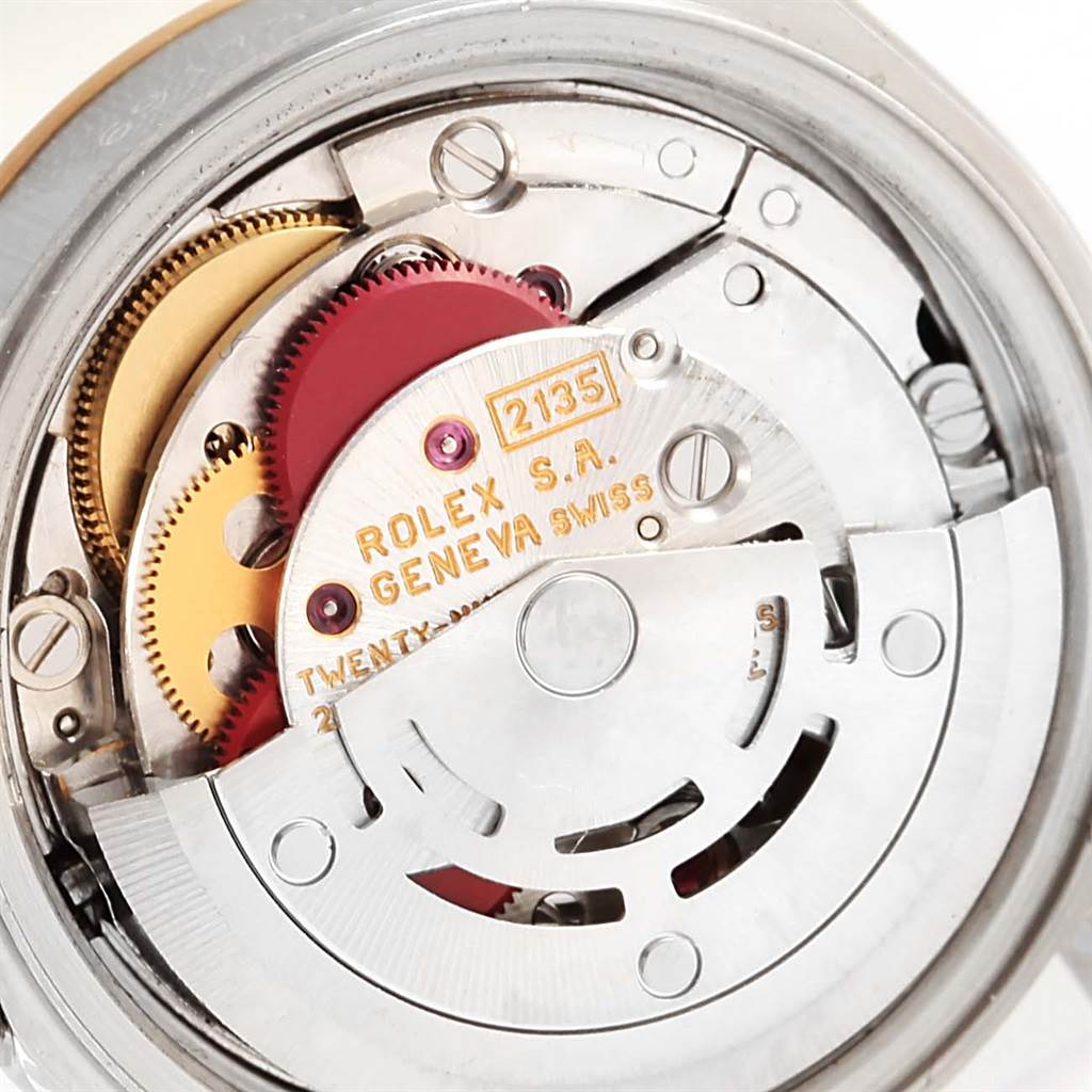 The image shows a close-up of the internal mechanism, specifically the movement, of the Rolex Datejust 69173 Women's Stainless Steel Black Dial 69173 Women's Stainless Steel Black Dial watch.
