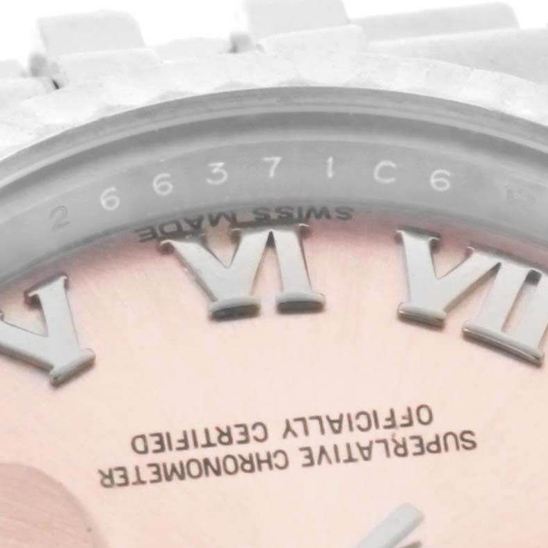 This image shows a close-up of the dial and Roman numerals on a Rolex Datejust 179174 Women's Stainless Steel Pink Dial 179174 Women's Stainless Steel Pink Dial watch, focusing on the "IV" and "VI" markers.