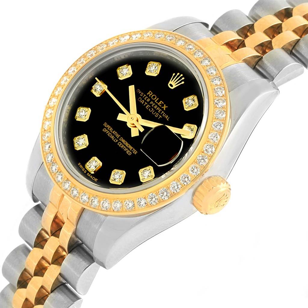 The image shows a close-up of a Rolex Datejust 179383 Women's Steel and Gold (two tone) Black Dial 179383 Women's Steel and Gold (two tone) Black Dial watch at a slight angle, highlighting the black dial, gold accents, and diamond-studded bezel.