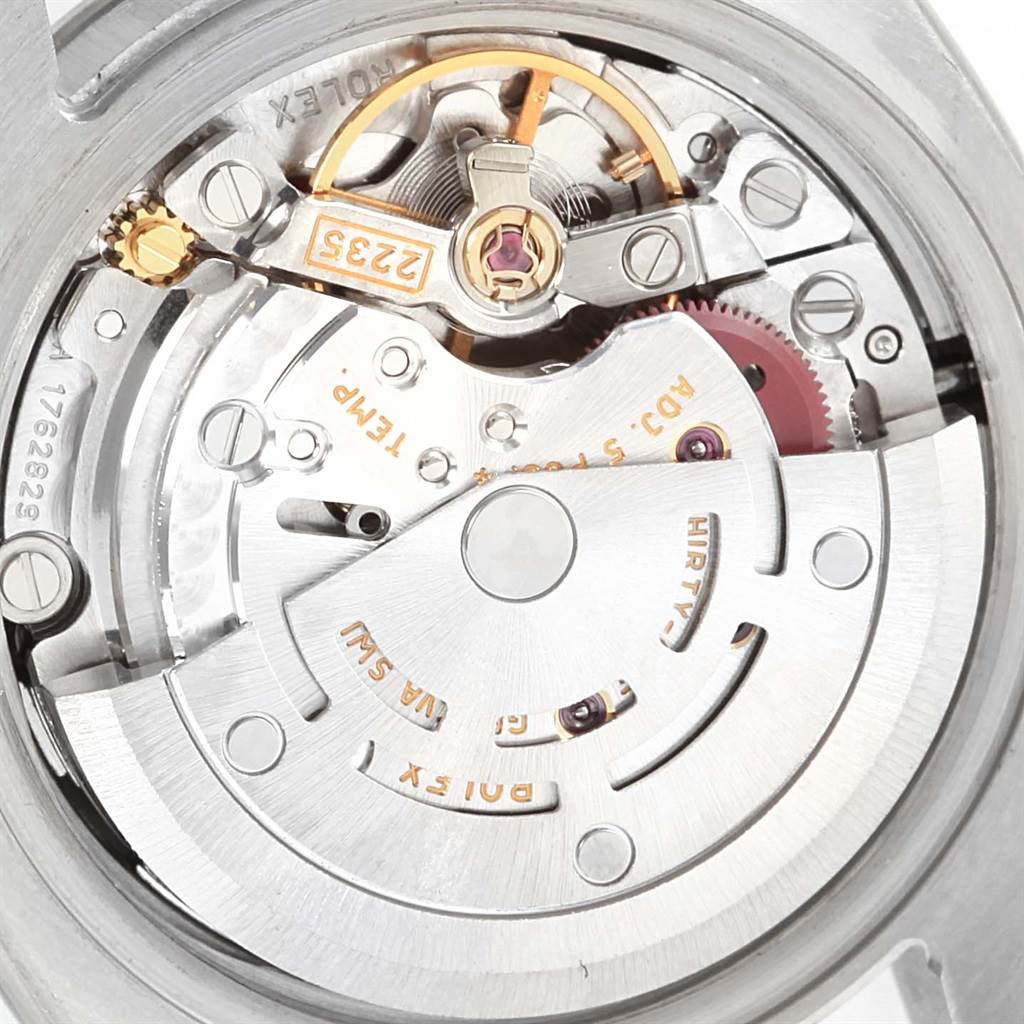 The image shows the internal mechanism and movement of a Rolex Datejust 179174 Women's Stainless Steel Black Dial 179174 Women's Stainless Steel Black Dial watch from a close-up angle.