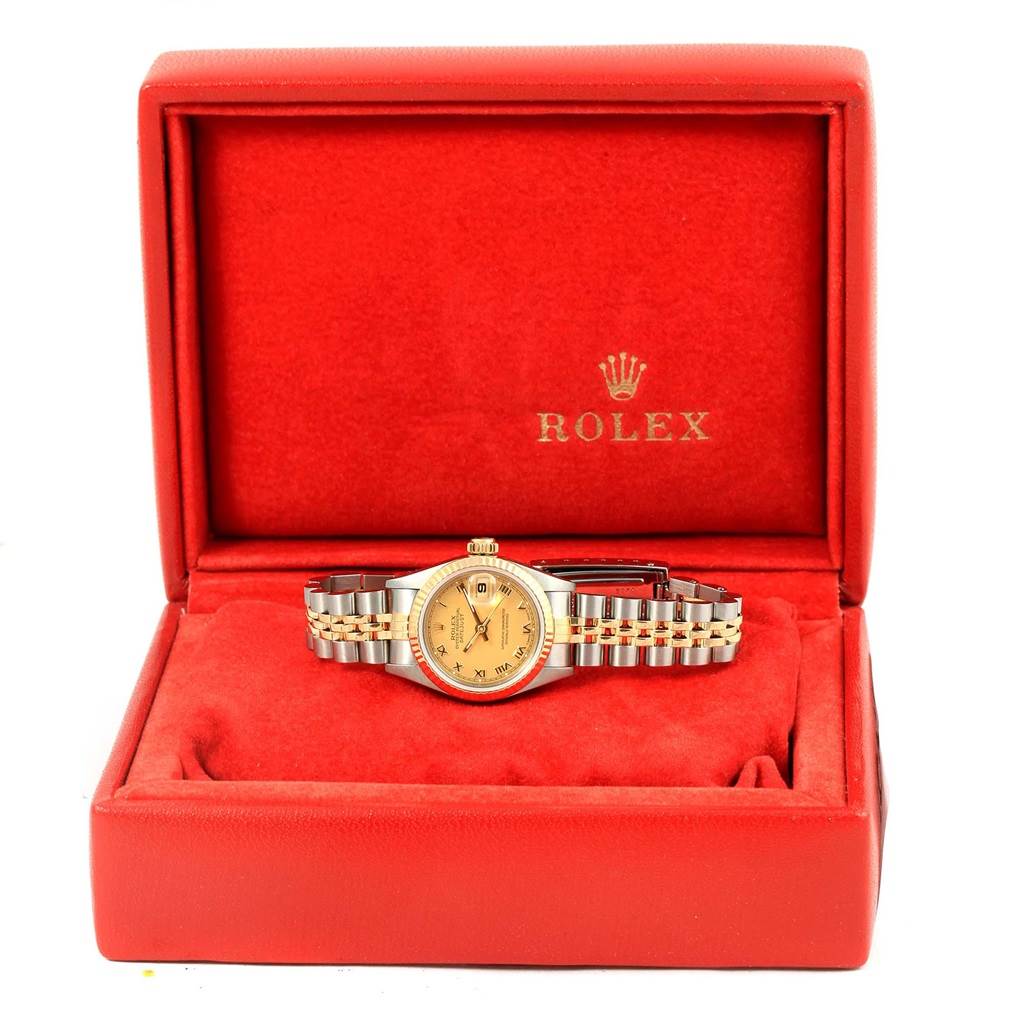 The Rolex Datejust 69173 Women's Stainless Steel Champagne Dial 69173 Women's Stainless Steel Champagne Dial watch is shown from a front angle in its open red box with the brand logo visible in the background.